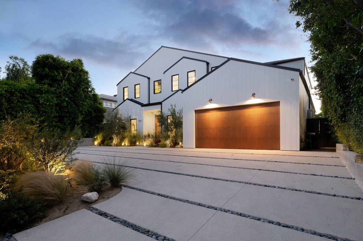 Modern home exterior at dusk after seasonal lighting removal